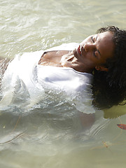 Ebony princess on the wild beach