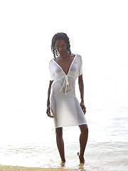 Ebony princess on the wild beach